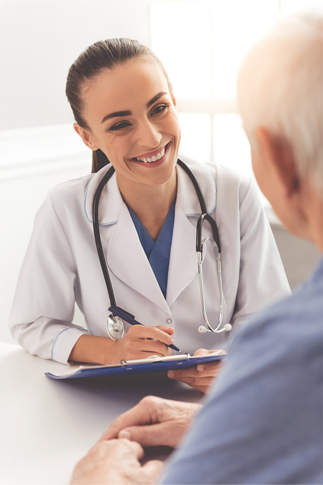 Female doctor smiling at patient